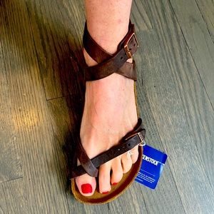 Birkenstock official cross strap ankle buckle sandals.